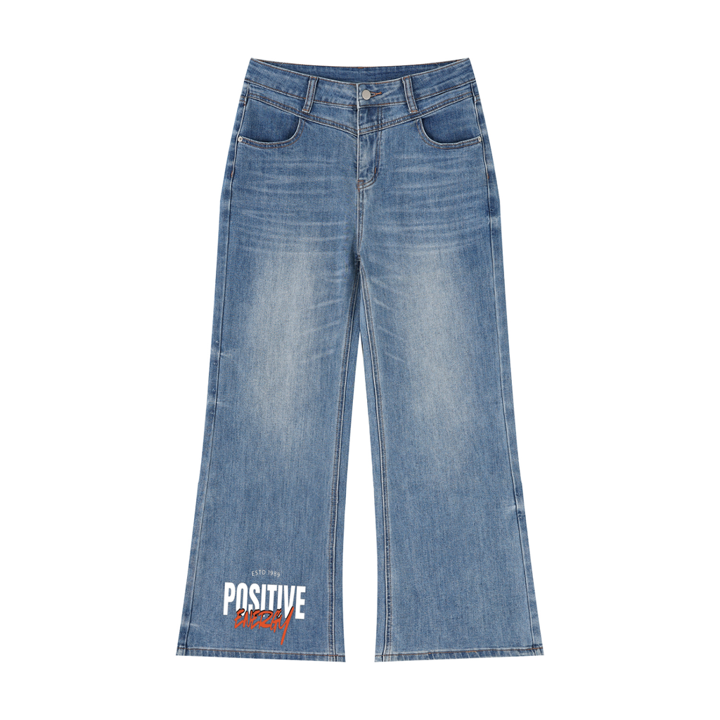 Vintage wash wide-leg jeans by RAREBINO with relaxed fit and high waist, displayed hanging on a wooden background.
