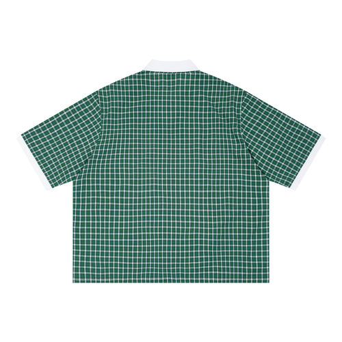 Boxy plaid color block polo shirt by RAREBINO featuring a classic collar, short sleeves, and bold plaid pattern.