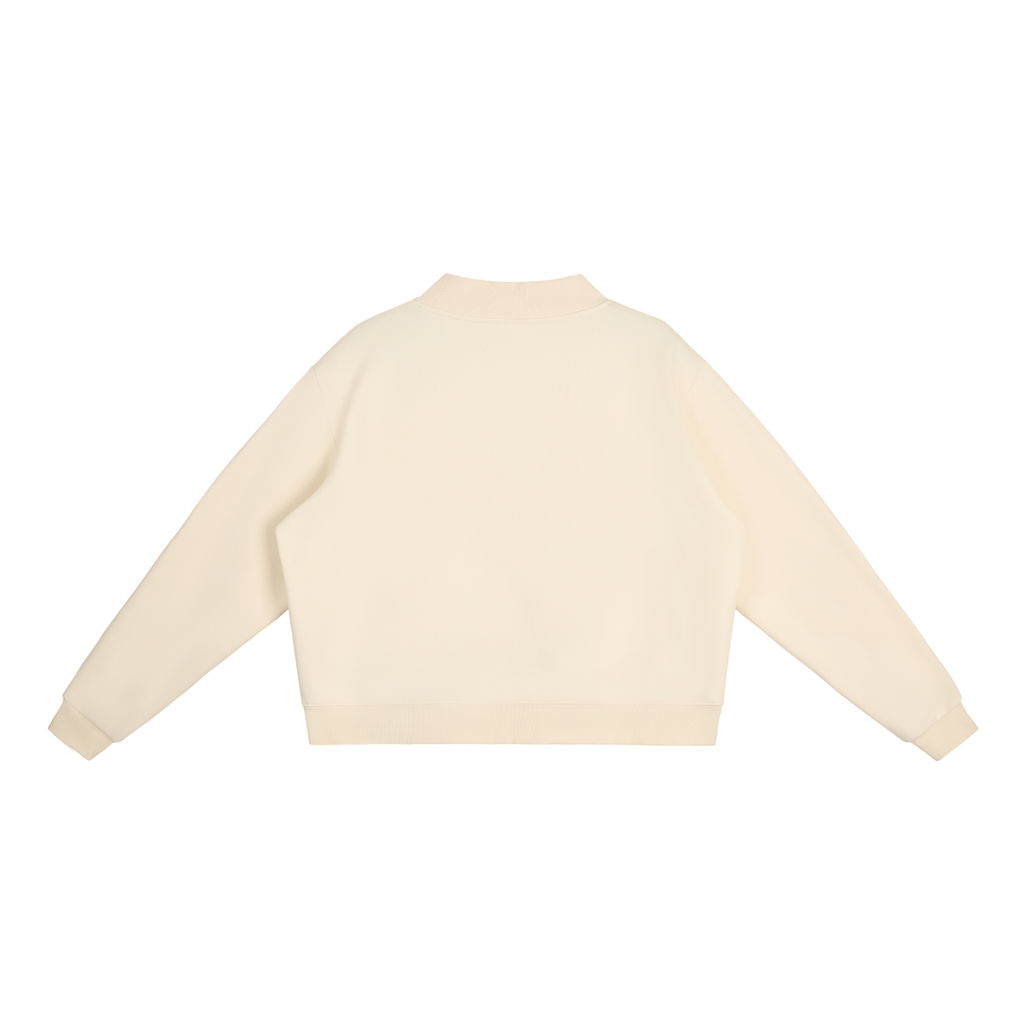Cream-colored RAREBINO Essential fleece mock-neck crew sweatshirt displayed on a hanger, showcasing its soft fabric and cozy fit.
