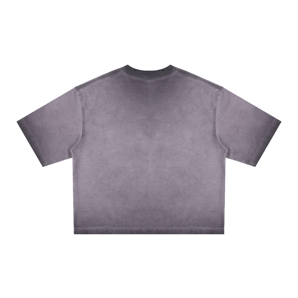 Reverse dyed boxy T-shirt by RAREBINO featuring a relaxed fit and unique color pattern, shown on a plain background.