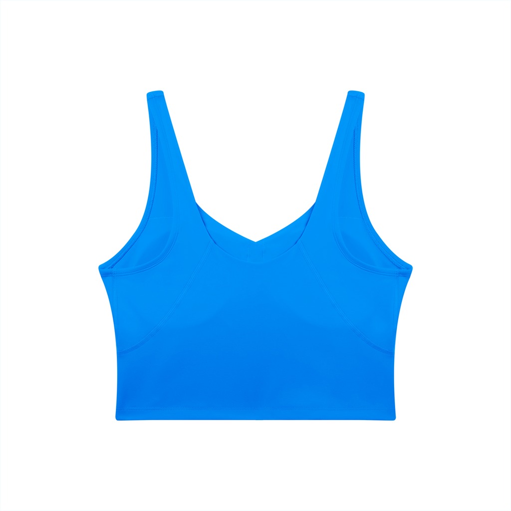 RAREBINO V-Neck yoga sports bra with supportive fit and breathable fabric, shown on a model in a workout setting.
