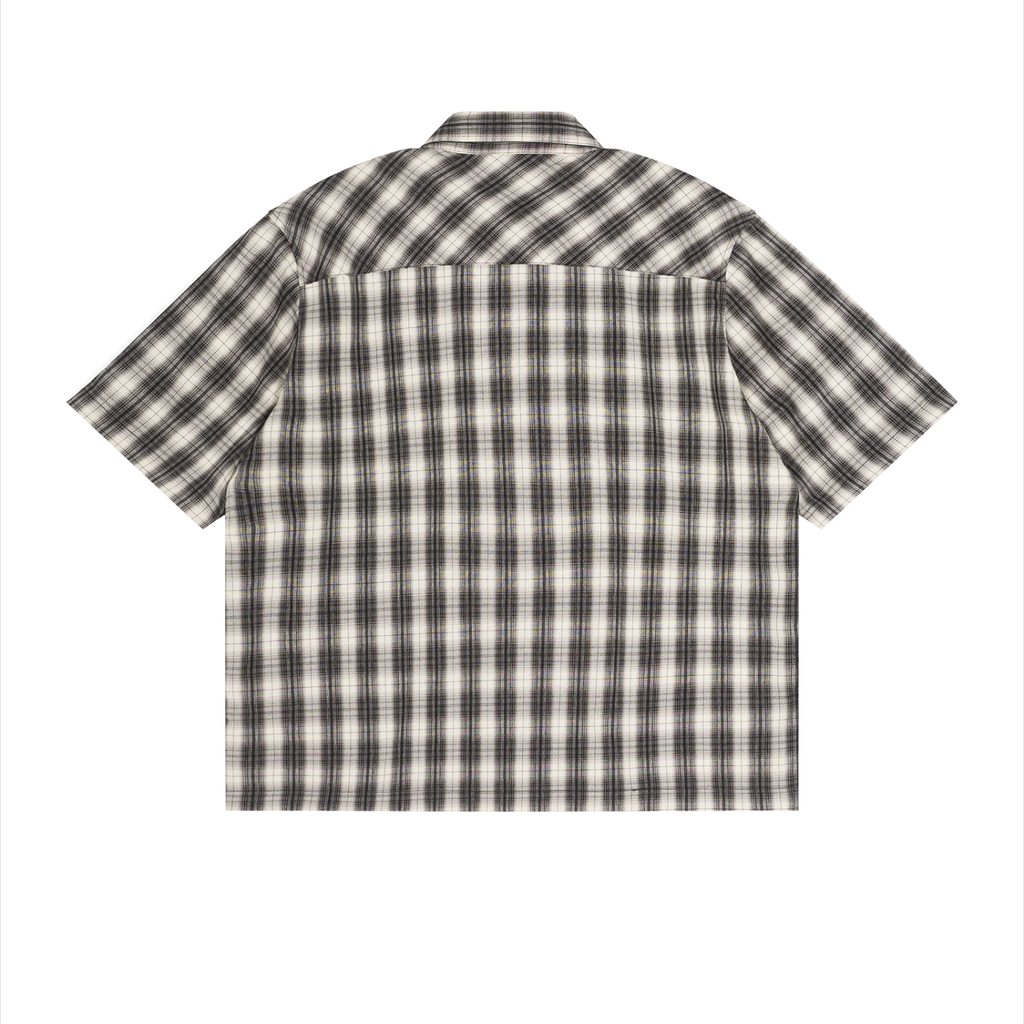 Boxy plaid short sleeve shirt by RAREBINO featuring a stylish pattern and relaxed fit, displayed on a mannequin.