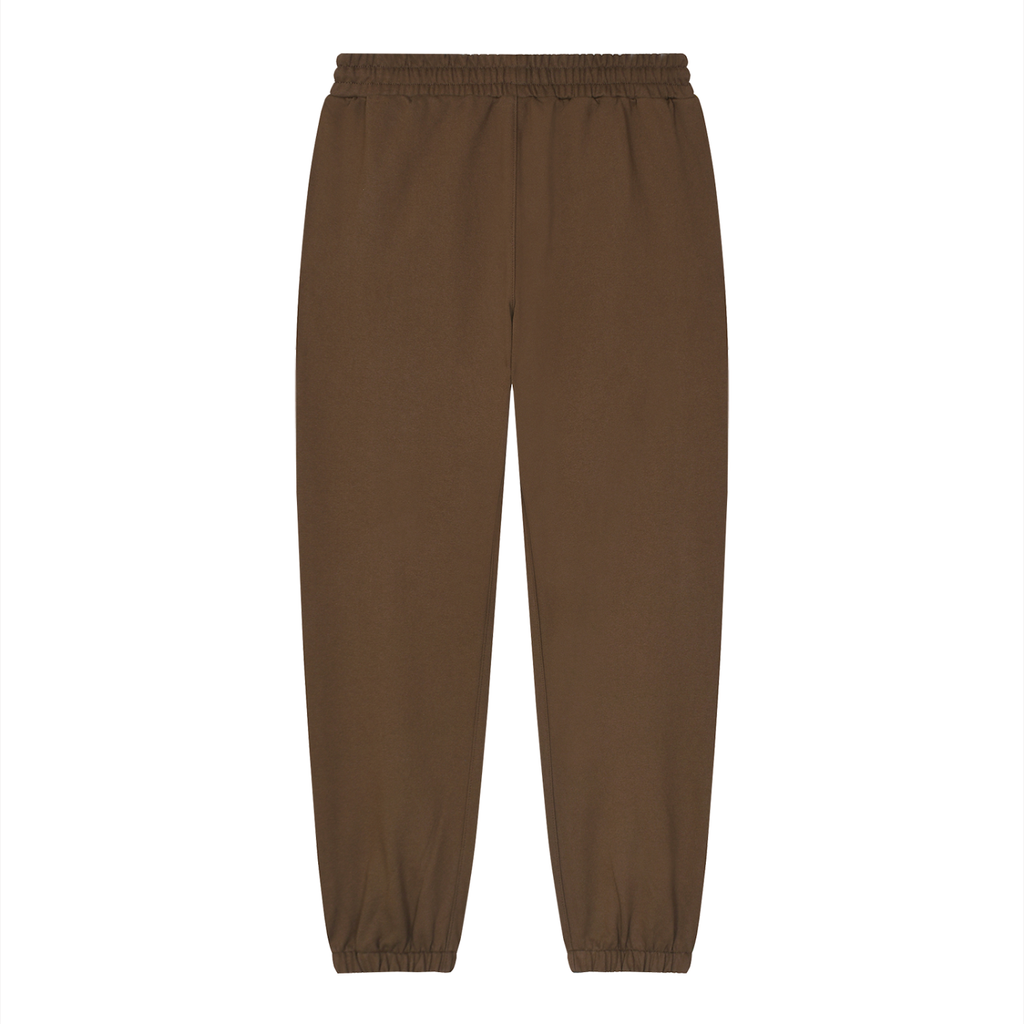 Loose fit tapered joggers from RAREBINO, soft fabric, with elastic waistband and cuffs, shown in a neutral color.