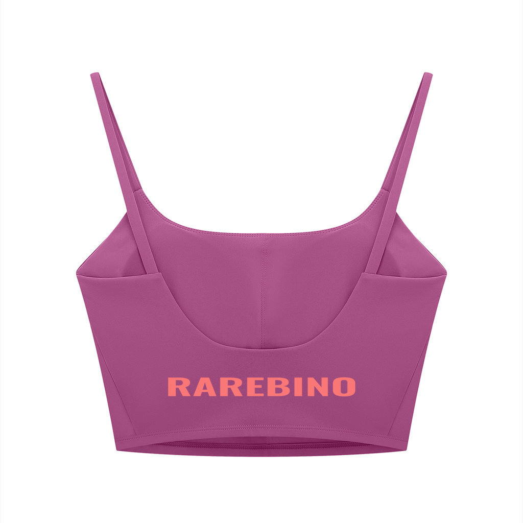 Women's solid color sports bra by RAREBINO, showing a comfortable fit and smooth fabric in a neutral shade.