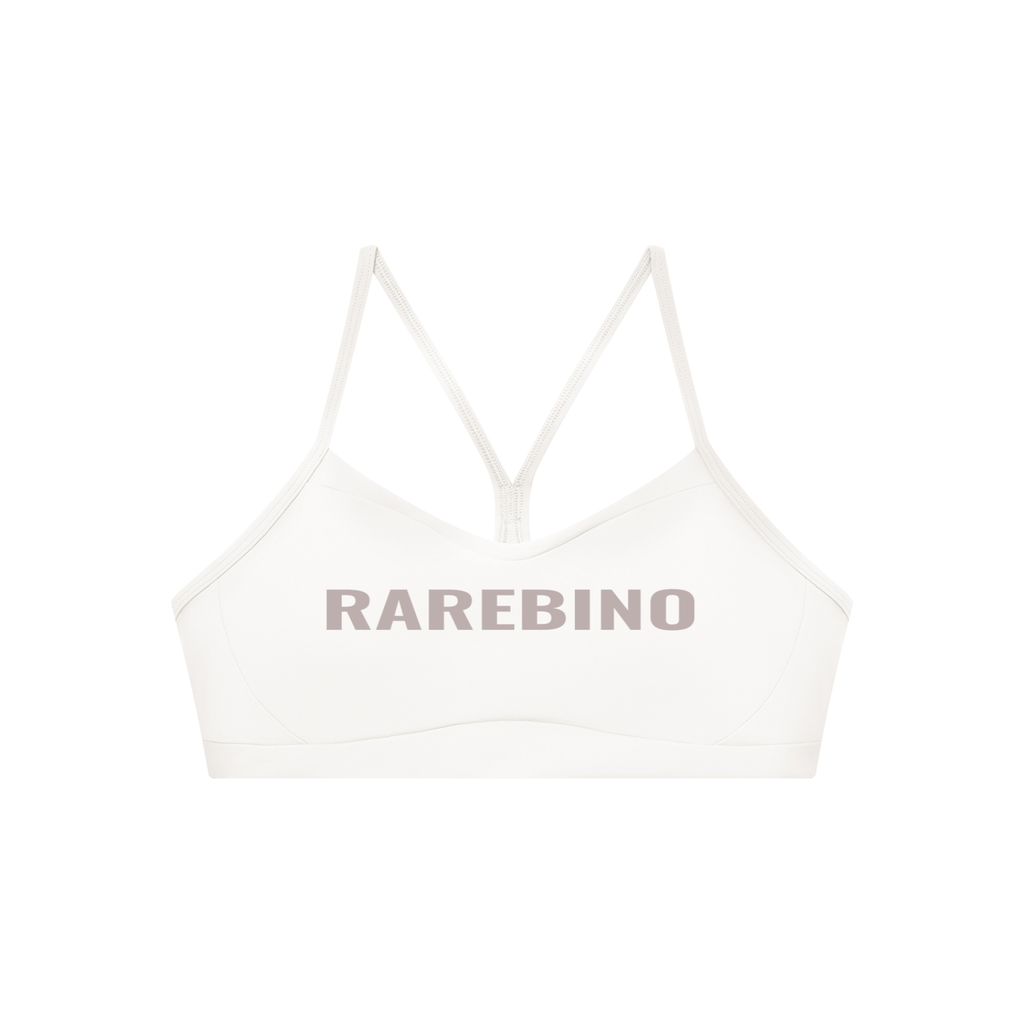 Women's tight cropped sports bra by RAREBINO, featuring a fitted design with breathable fabric and a supportive elastic band.