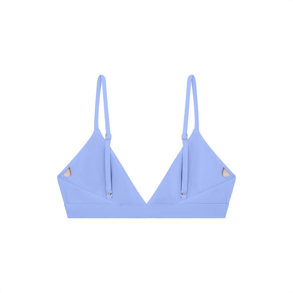 Cropped V-neck sports bra by RAREBINO with supportive fit and breathable fabric, shown on a mannequin.