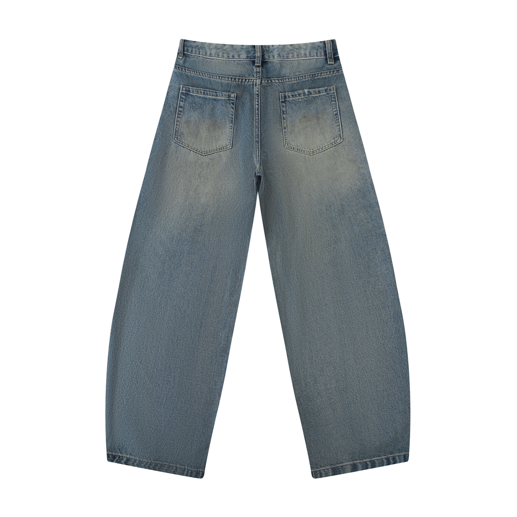 Distressed barrel leg jeans by RAREBINO featuring a relaxed fit, faded wash, and stylish distressed details.