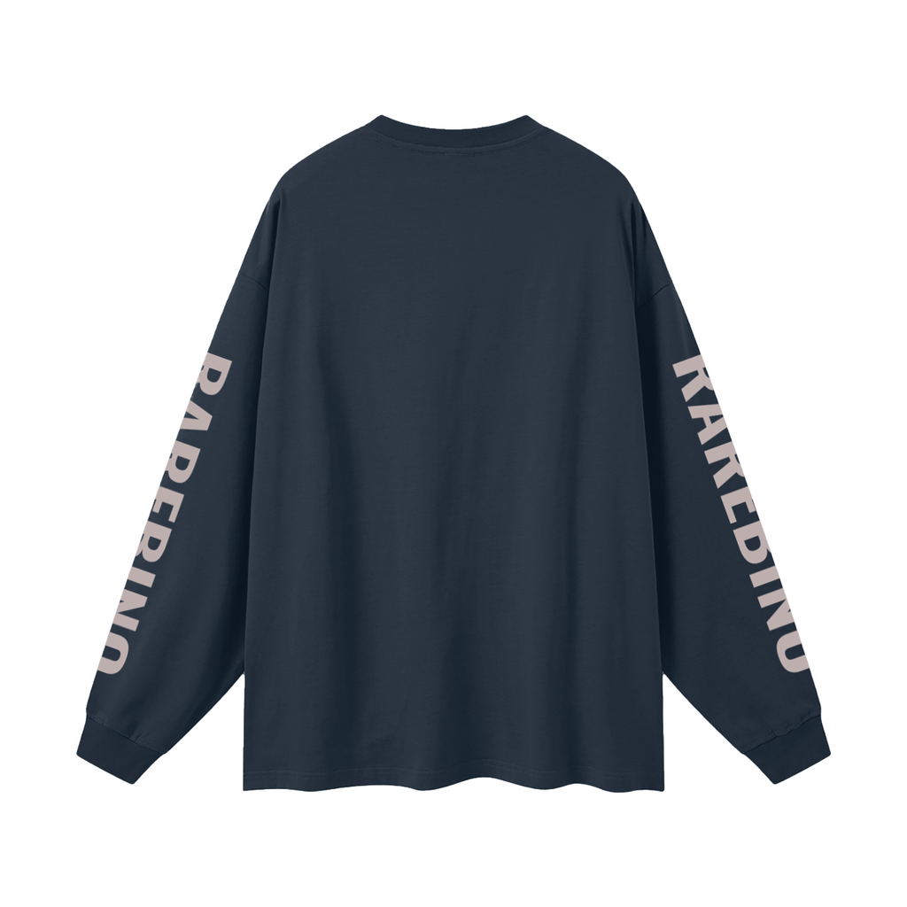 Oversized long sleeve T-shirt by RAREBINO displayed on a hanger, featuring a relaxed fit and soft fabric in a casual style.