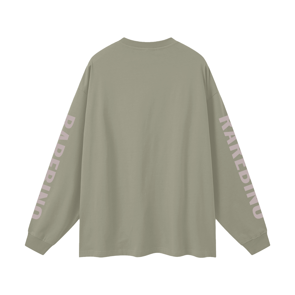 Oversized long sleeve T-shirt by RAREBINO, light fabric, relaxed fit, with a simple design, shown on a hanger.
