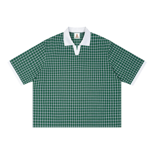Boxy plaid color block polo shirt by RAREBINO with a classic collar and short sleeves, featuring a vibrant, geometric pattern.