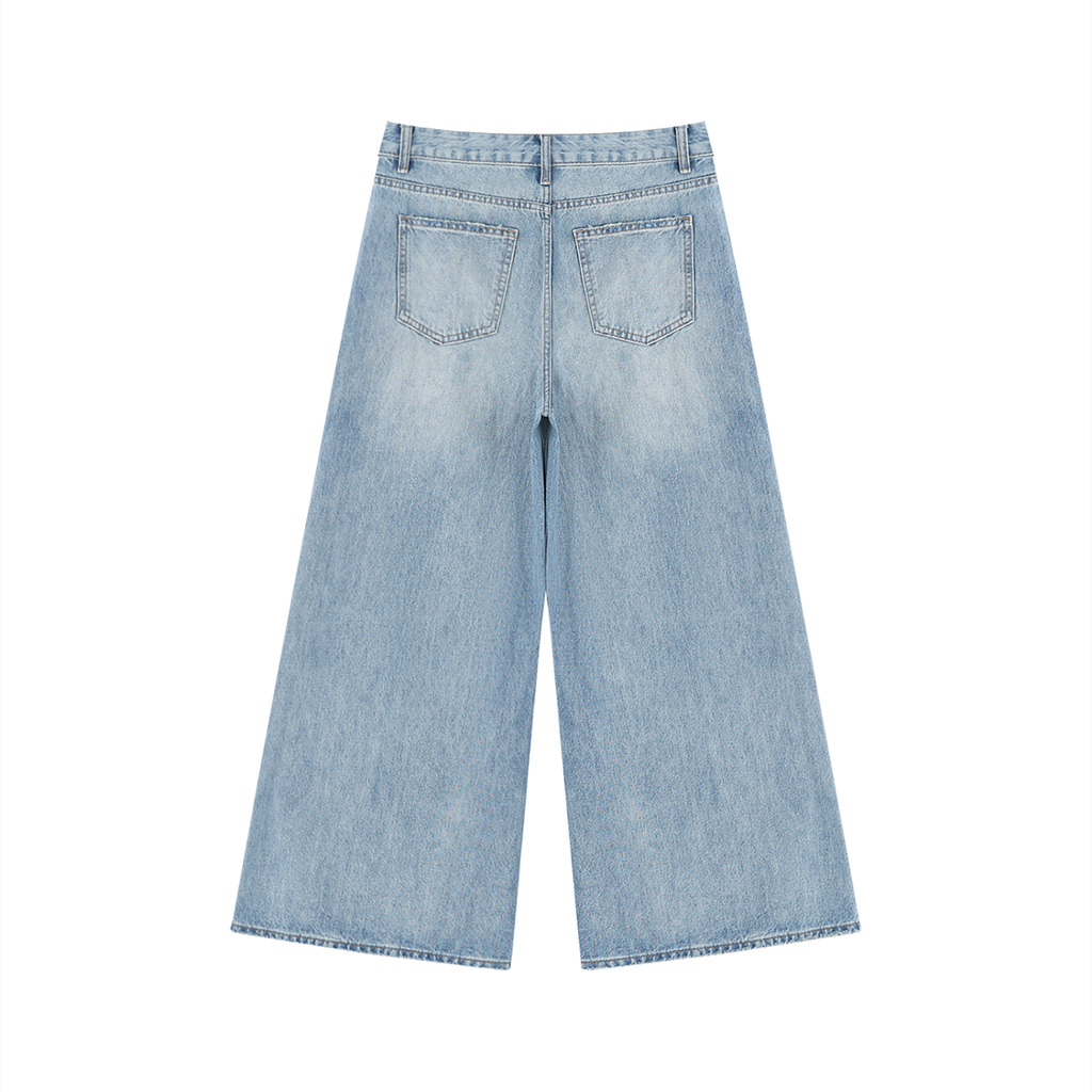 Vintage wash distressed wide leg jeans by RAREBINO with a relaxed fit and faded, worn-in look.
