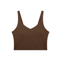 RAREBINO V-neck yoga sports bra with supportive fit, shown in black with wide shoulder straps and seamless design for comfort.