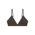 Light pink RAREBINO cropped V-neck sports bra with wide straps and breathable fabric, designed for comfort during workouts.