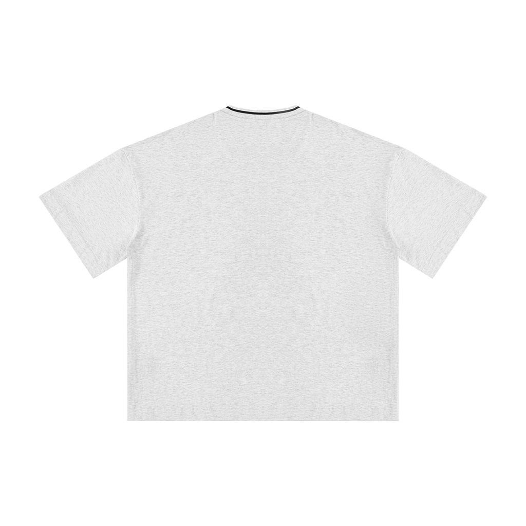 Close-up of RAREBINO boxy ribbed T-shirt, showcasing its textured ribbed fabric and relaxed fit in a neutral color.