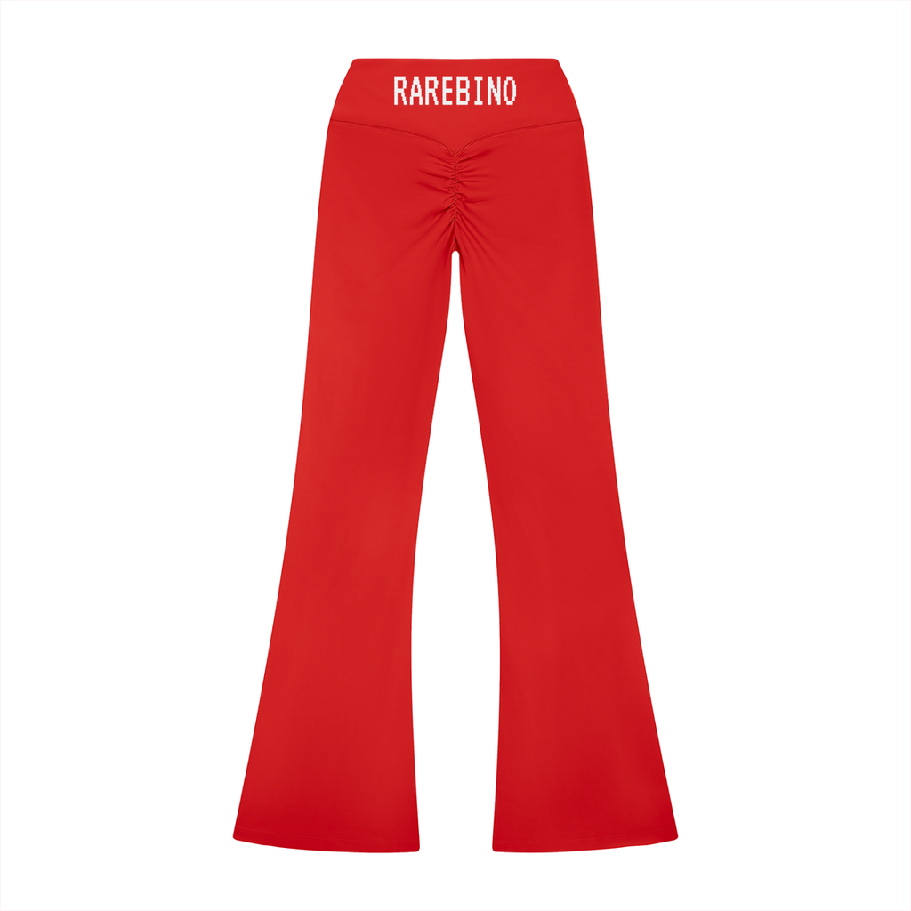 High rise flared leggings by RAREBINO, featuring a snug fit at the waist and flared legs, shown in a vibrant color.