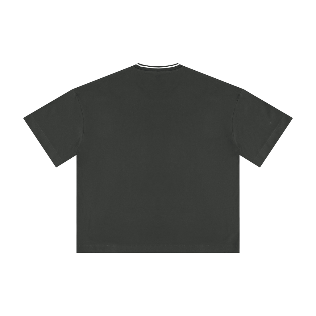 Boxy ribbed T-shirt by RAREBINO featuring a fitted, textured design in a neutral color on a plain background.