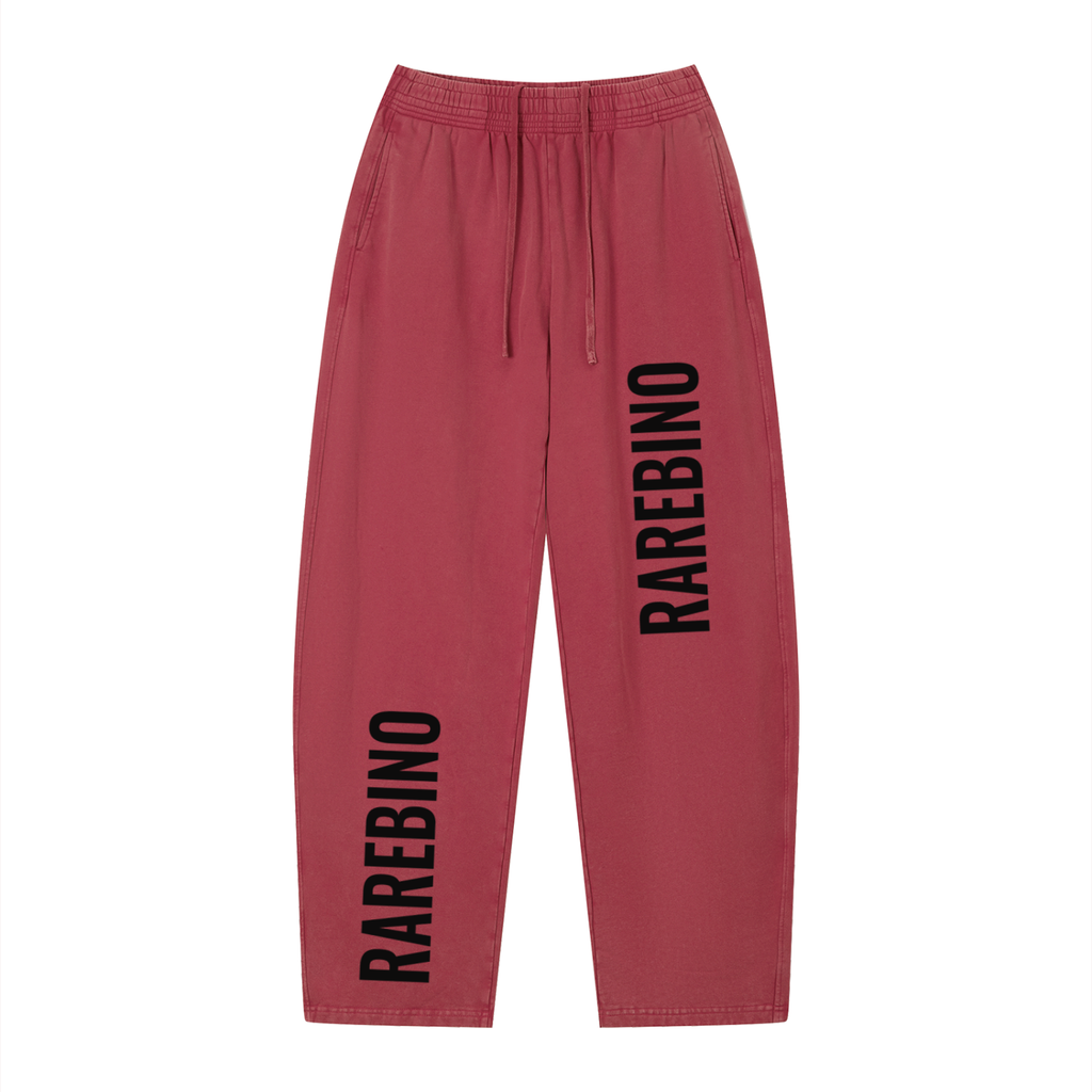 Vintage wash loose sweatpants from RAREBINO with relaxed fit and distressed fabric, shown laid flat on a neutral background.